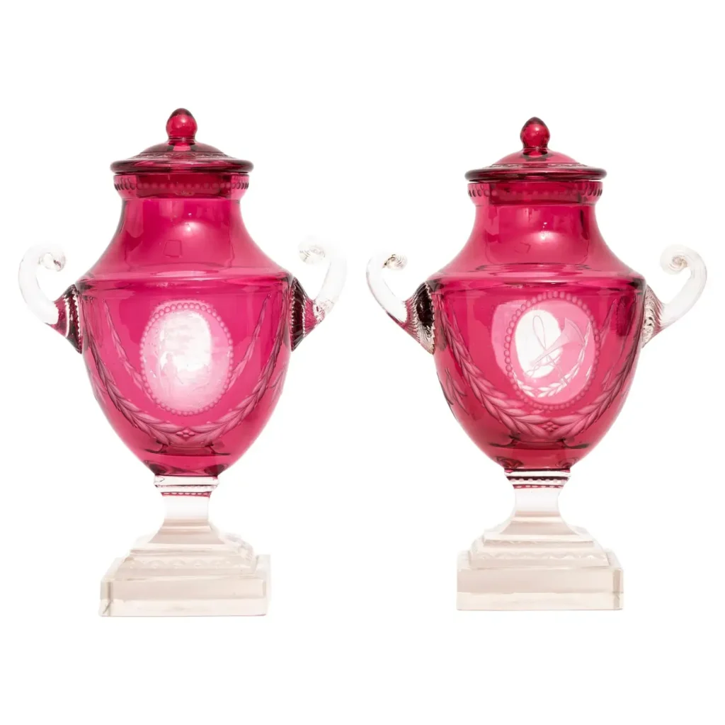 Pr. Baccarat Red Cut-to-Clear Covered Vases w/ Central Cameo of Hunting Trophies