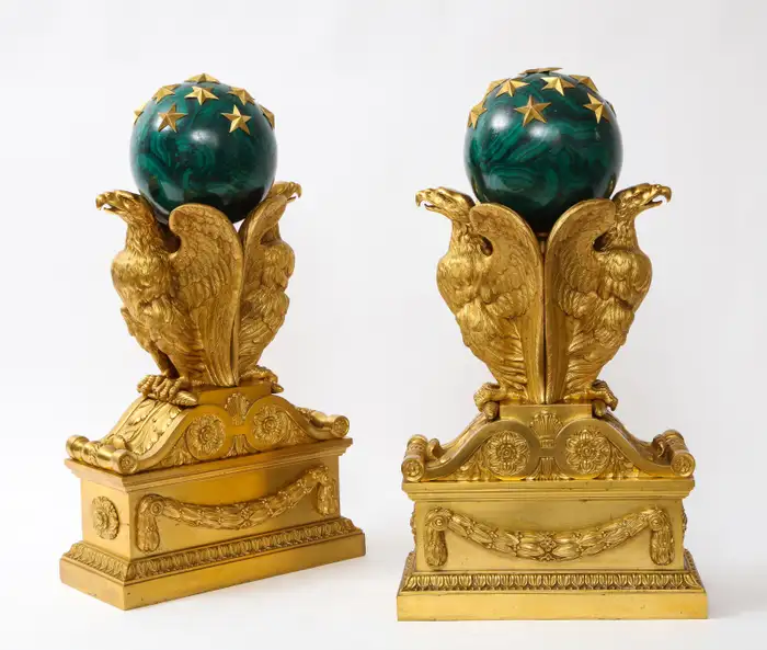 A Pair of Signed French Ormolu Double Eagle Andirons w/ Faux Malachite Globes